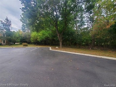 Beautifully updated end-unit brick condo in the highly desirable on Great Oaks Country Club in Michigan - for sale on GolfHomes.com, golf home, golf lot