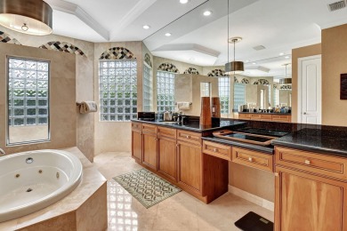 Experience luxury living in this exquisite 5-bedroom, 5-bathroom on Mizner Country Club in Florida - for sale on GolfHomes.com, golf home, golf lot