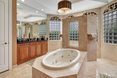 Experience luxury living in this exquisite 5-bedroom, 5-bathroom on Mizner Country Club in Florida - for sale on GolfHomes.com, golf home, golf lot