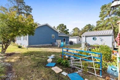 LOCATION IS EVERYTHING!!! This cute as can be home located in on Oyster Bay Golf Links in North Carolina - for sale on GolfHomes.com, golf home, golf lot