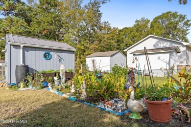 LOCATION IS EVERYTHING!!! This cute as can be home located in on Oyster Bay Golf Links in North Carolina - for sale on GolfHomes.com, golf home, golf lot