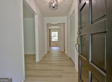 From the moment you walk into this home you know it has been on Canongate At Flat Creek Club in Georgia - for sale on GolfHomes.com, golf home, golf lot