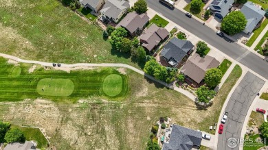 Cute as can be and packed with perks! This 3 bed, 3 bath ranch on Mad Russian Golf Course in Colorado - for sale on GolfHomes.com, golf home, golf lot