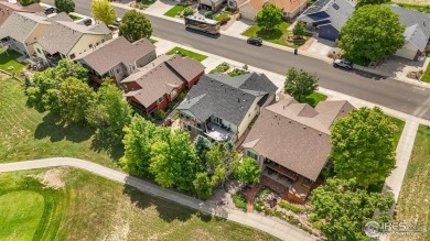 Cute as can be and packed with perks! This 3 bed, 3 bath ranch on Mad Russian Golf Course in Colorado - for sale on GolfHomes.com, golf home, golf lot