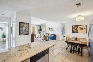 EXCEPTIONAL 2-bedroom, 2-bathroom condo, nestled within the on Hunters Green Country Club in Florida - for sale on GolfHomes.com, golf home, golf lot