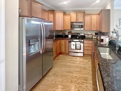 Fantastic open floor plan with Hardwood floors in foyer, powder on Charleston National Golf Club in South Carolina - for sale on GolfHomes.com, golf home, golf lot