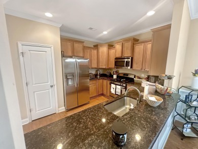 Fantastic open floor plan with Hardwood floors in foyer, powder on Charleston National Golf Club in South Carolina - for sale on GolfHomes.com, golf home, golf lot