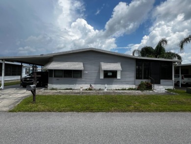 Community living in a great location with tons of activities in on Lake Henry Golf Club in Florida - for sale on GolfHomes.com, golf home, golf lot
