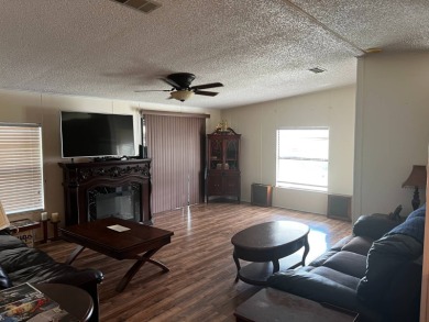 Community living in a great location with tons of activities in on Lake Henry Golf Club in Florida - for sale on GolfHomes.com, golf home, golf lot