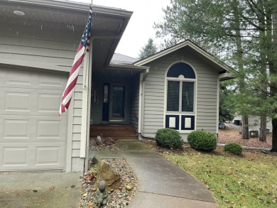 All the best of care-free condo living! Great room with gas on Michaywe Pines Course in Michigan - for sale on GolfHomes.com, golf home, golf lot