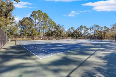 EXCEPTIONAL 2-bedroom, 2-bathroom condo, nestled within the on Hunters Green Country Club in Florida - for sale on GolfHomes.com, golf home, golf lot