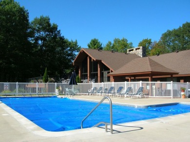 All the best of care-free condo living! Great room with gas on Michaywe Pines Course in Michigan - for sale on GolfHomes.com, golf home, golf lot