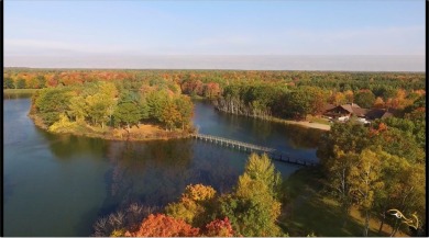 All the best of care-free condo living! Great room with gas on Michaywe Pines Course in Michigan - for sale on GolfHomes.com, golf home, golf lot