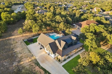 Experience refined country living in this exceptional modern on Sugar Tree Golf and Country Club in Texas - for sale on GolfHomes.com, golf home, golf lot