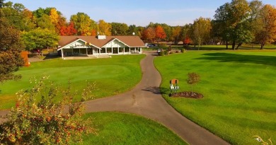 All the best of care-free condo living! Great room with gas on Michaywe Pines Course in Michigan - for sale on GolfHomes.com, golf home, golf lot