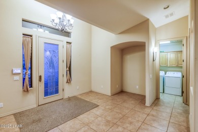Welcome to your dream home in the highly desirable Residential on London Bridge Golf Course in Arizona - for sale on GolfHomes.com, golf home, golf lot