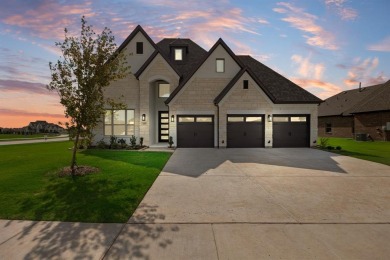 This highly sought-after single-story Altura Aspen floorplan is on Heath Golf and Yacht Club in Texas - for sale on GolfHomes.com, golf home, golf lot