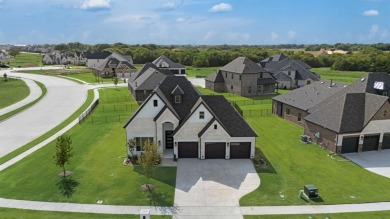 This highly sought-after single-story Altura Aspen floorplan is on Heath Golf and Yacht Club in Texas - for sale on GolfHomes.com, golf home, golf lot