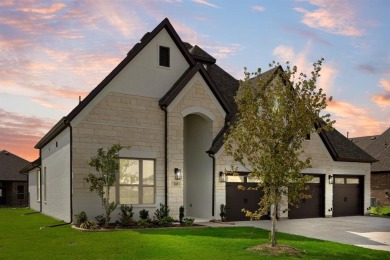 This highly sought-after single-story Altura Aspen floorplan is on Heath Golf and Yacht Club in Texas - for sale on GolfHomes.com, golf home, golf lot