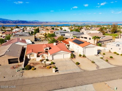 Two properties in one! You need to see this place in person on London Bridge Golf Course in Arizona - for sale on GolfHomes.com, golf home, golf lot