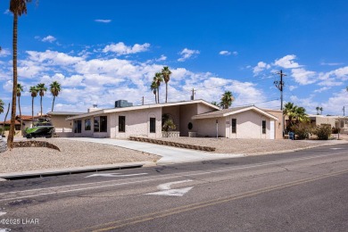 Welcome to 2475 Saratoga located on a premium corner lot, this on London Bridge Golf Course in Arizona - for sale on GolfHomes.com, golf home, golf lot