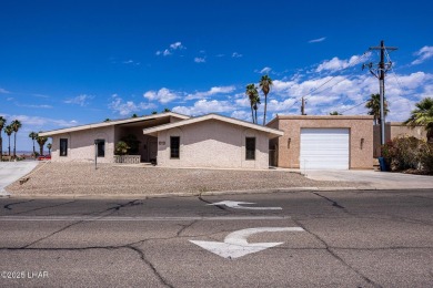 Welcome to 2475 Saratoga located on a premium corner lot, this on London Bridge Golf Course in Arizona - for sale on GolfHomes.com, golf home, golf lot