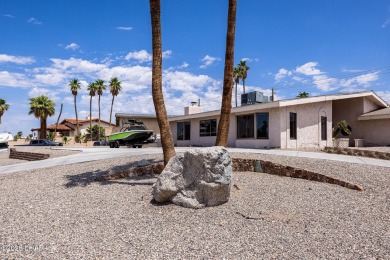 Welcome to 2475 Saratoga located on a premium corner lot, this on London Bridge Golf Course in Arizona - for sale on GolfHomes.com, golf home, golf lot