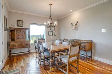 Step into the extraordinary at 8225 Scotscraig Ct, a masterfully on The Retreat in Texas - for sale on GolfHomes.com, golf home, golf lot