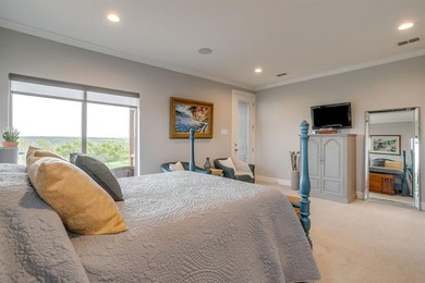 Step into the extraordinary at 8225 Scotscraig Ct, a masterfully on The Retreat in Texas - for sale on GolfHomes.com, golf home, golf lot