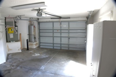 LOCATION, LOCATION, LOCATION! Just minutes from Lake Sumter on El Santiago Executive Golf Course in Florida - for sale on GolfHomes.com, golf home, golf lot