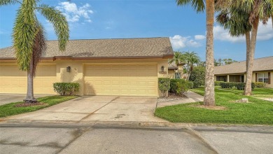 This desirable villa boast a recently installed roof, HVAC on University Park Country Club in Florida - for sale on GolfHomes.com, golf home, golf lot