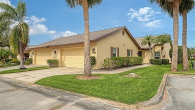 This desirable villa boast a recently installed roof, HVAC on University Park Country Club in Florida - for sale on GolfHomes.com, golf home, golf lot