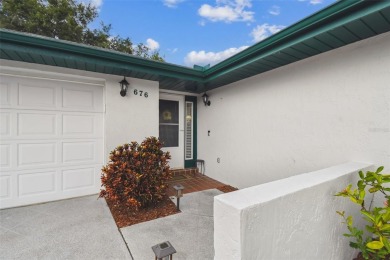 Welcome to 676 Augusta, a charming and well-maintained home on Cypresswood Golf and Country Club in Florida - for sale on GolfHomes.com, golf home, golf lot