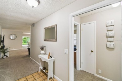 Welcome to 676 Augusta, a charming and well-maintained home on Cypresswood Golf and Country Club in Florida - for sale on GolfHomes.com, golf home, golf lot