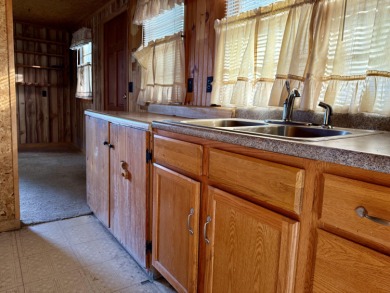 Tucked away in the heart of Rockwood, this charming 480 sq. ft on Mt. Kineo Golf Course in Maine - for sale on GolfHomes.com, golf home, golf lot