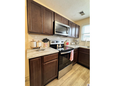 Charming 1 bed, 1 bath home offering comfortable living space on  in Kentucky - for sale on GolfHomes.com, golf home, golf lot