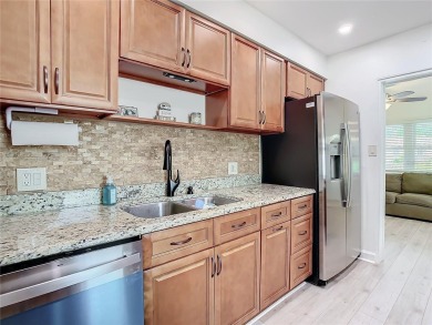 Under contract-accepting backup offers. SELLER SAYS SELL! on The Dunedin Country Club in Florida - for sale on GolfHomes.com, golf home, golf lot