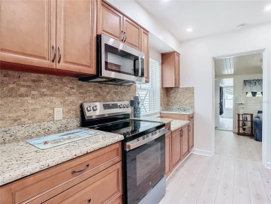 Under contract-accepting backup offers. SELLER SAYS SELL! on The Dunedin Country Club in Florida - for sale on GolfHomes.com, golf home, golf lot
