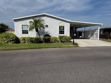 Step Inside This Exceptional Home: Your Dream Awaits!    Homes on Four Lakes Golf Club in Florida - for sale on GolfHomes.com, golf home, golf lot