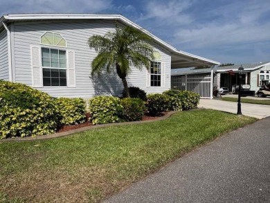 Step Inside This Exceptional Home: Your Dream Awaits!    Homes on Four Lakes Golf Club in Florida - for sale on GolfHomes.com, golf home, golf lot