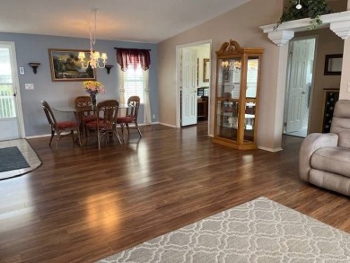Step Inside This Exceptional Home: Your Dream Awaits!    Homes on Four Lakes Golf Club in Florida - for sale on GolfHomes.com, golf home, golf lot