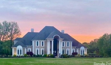 This magnificent estate home sits on 4 acres in the exclusive on RidgePointe Country Club in Arkansas - for sale on GolfHomes.com, golf home, golf lot