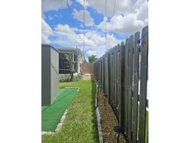 This Gorgeous home located in quiet Sunrise Golf Village. The on Sunrise Lakes Phase IV Golf Course in Florida - for sale on GolfHomes.com, golf home, golf lot