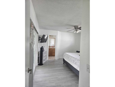 This Gorgeous home located in quiet Sunrise Golf Village. The on Sunrise Lakes Phase IV Golf Course in Florida - for sale on GolfHomes.com, golf home, golf lot