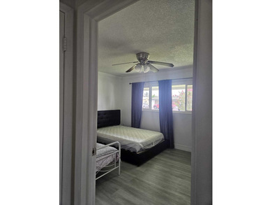 This Gorgeous home located in quiet Sunrise Golf Village. The on Sunrise Lakes Phase IV Golf Course in Florida - for sale on GolfHomes.com, golf home, golf lot