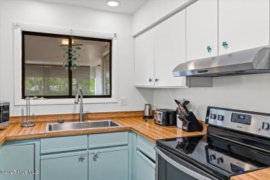 Discover Your Fully Furnished Island Haven with Direct Beach on Founders Club At St. James Plantation in North Carolina - for sale on GolfHomes.com, golf home, golf lot