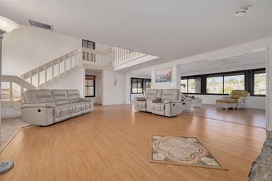 Welcome to this inviting waterfront community, where a tropical on Gulf Harbors Golf Course in Florida - for sale on GolfHomes.com, golf home, golf lot