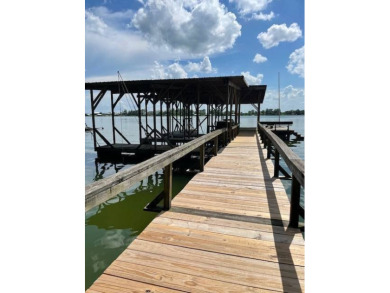 Enjoy the best of Lake Bruin living at this fully furnished on Lake Bruin Golf and Country Club in Louisiana - for sale on GolfHomes.com, golf home, golf lot