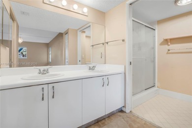 Ground floor corner Magnolia unit, with garden views, and on Flamingo Lakes Country Club in Florida - for sale on GolfHomes.com, golf home, golf lot