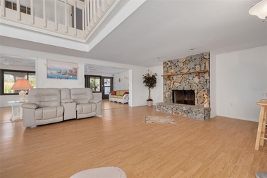 Welcome to this inviting waterfront community, where a tropical on Gulf Harbors Golf Course in Florida - for sale on GolfHomes.com, golf home, golf lot